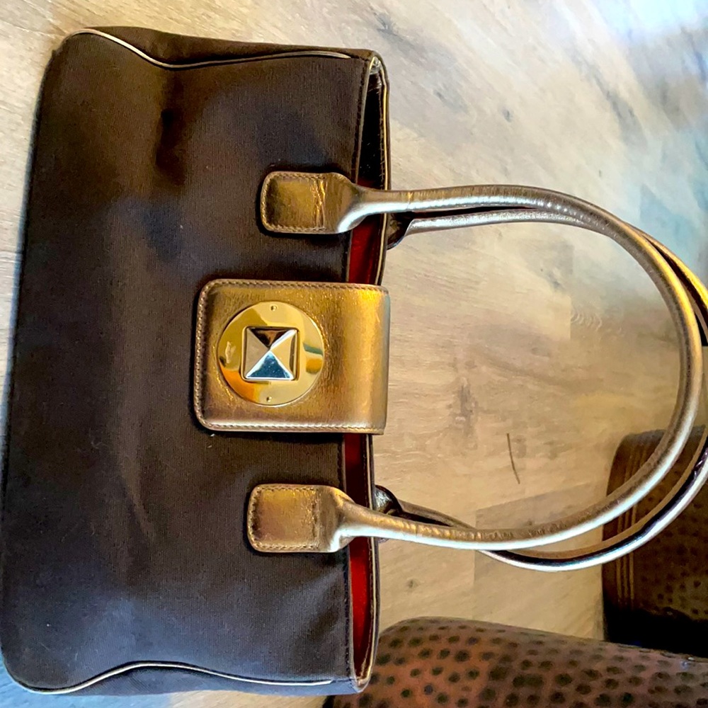 Kate Spade handbag in brown with gold handle